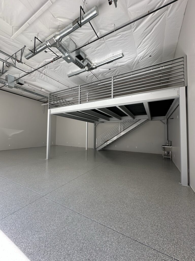 Gray Blue Flake commercial floor coating with mezzanine in Fountain Hills AZ by RX Garage