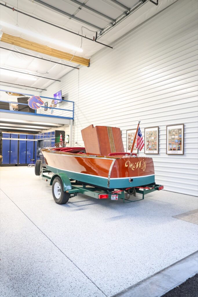Gray Flake garage condo floor coating with boat in Scottsdale AZ by RX Garage