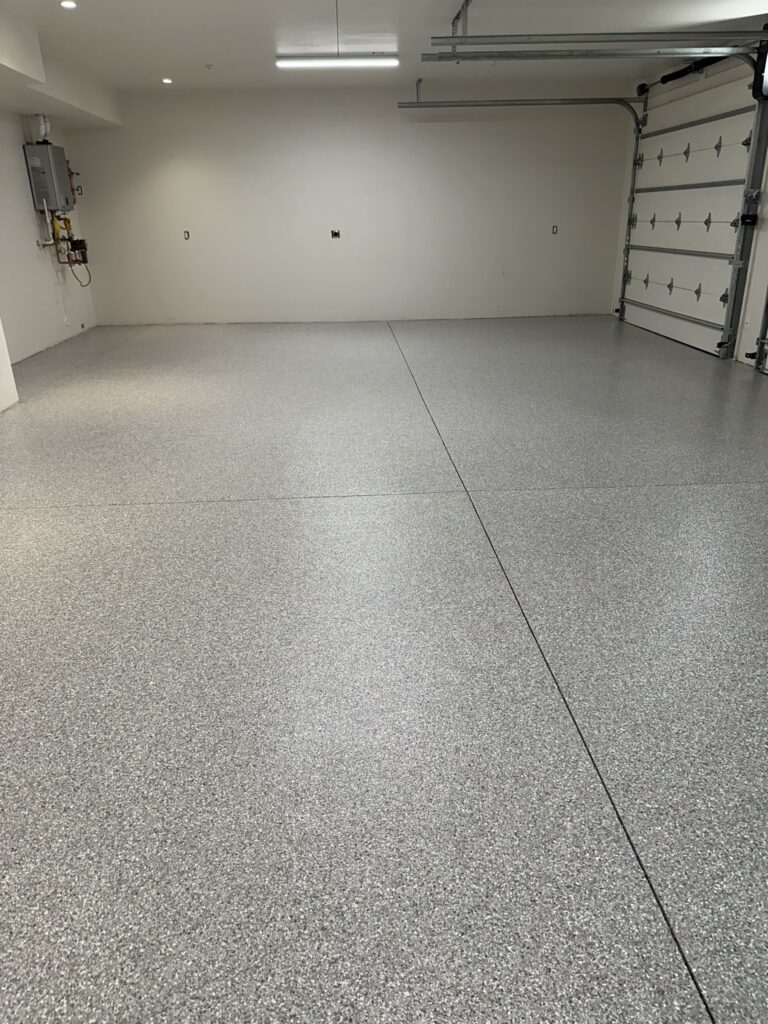 Gray Flake garage floor coating in Scottsdale AZ by RX Garage