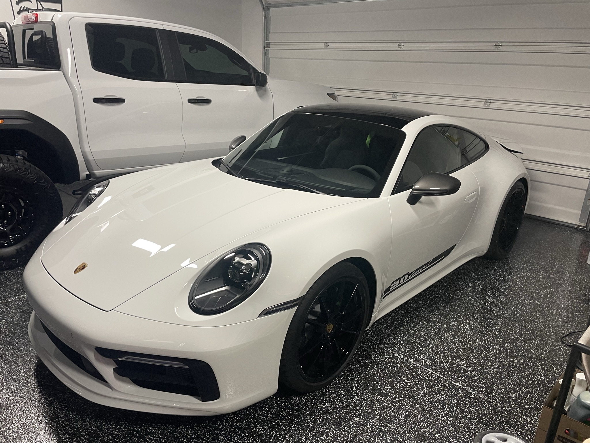 Gray Flake garage floor coating with Porsche in Scottsdale AZ by RX Garage
