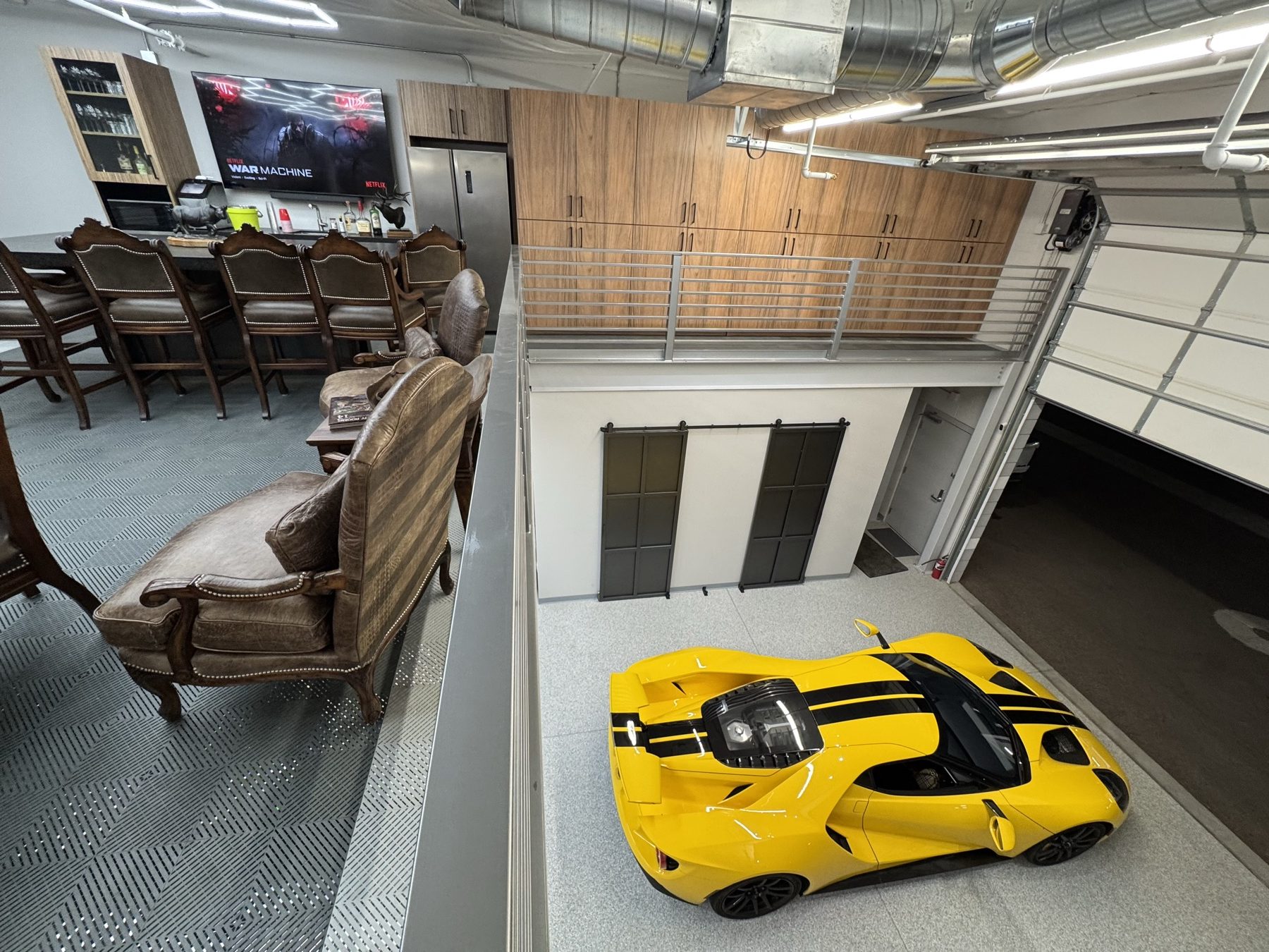 Motor Vault Fountain Hills luxury garage suite gray flake floor by RX Garage LLC