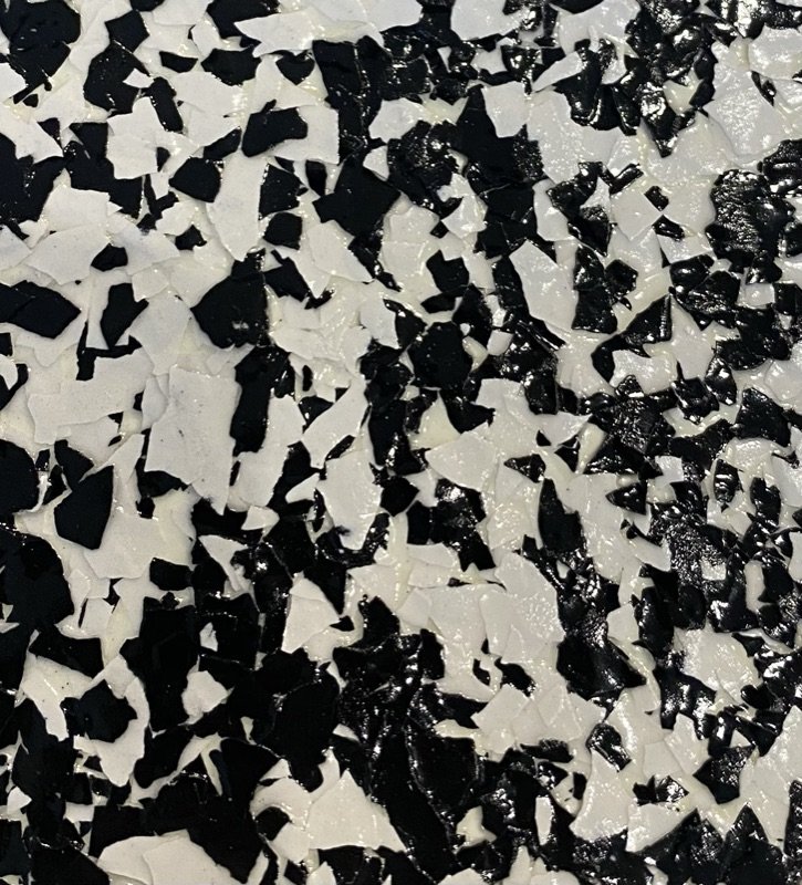 Tuxedo garage floor coating color sample — black and white flake polyaspartic system by RX Garage LLC Fountain Hills AZ
